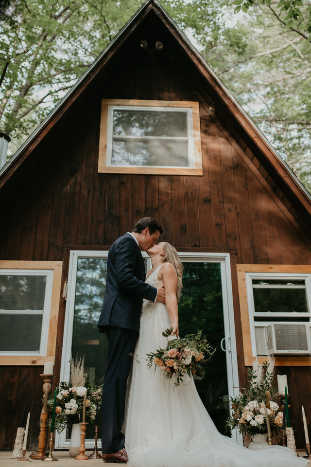 Bride and Groom at A-frame cabin wedding in New Hampshire